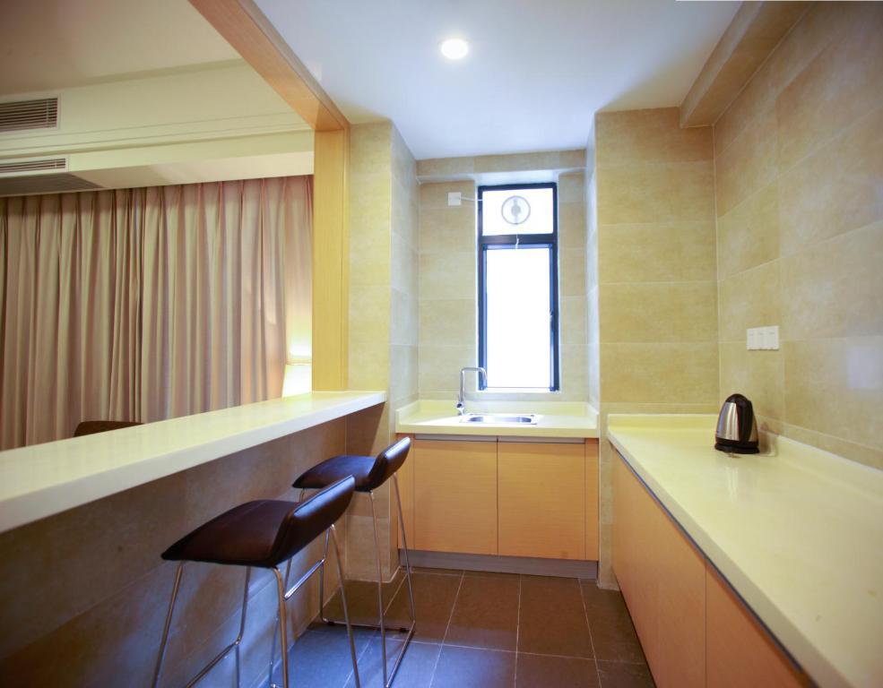 Xcellent International Serviced Apartment Guangzhou Bilik gambar
